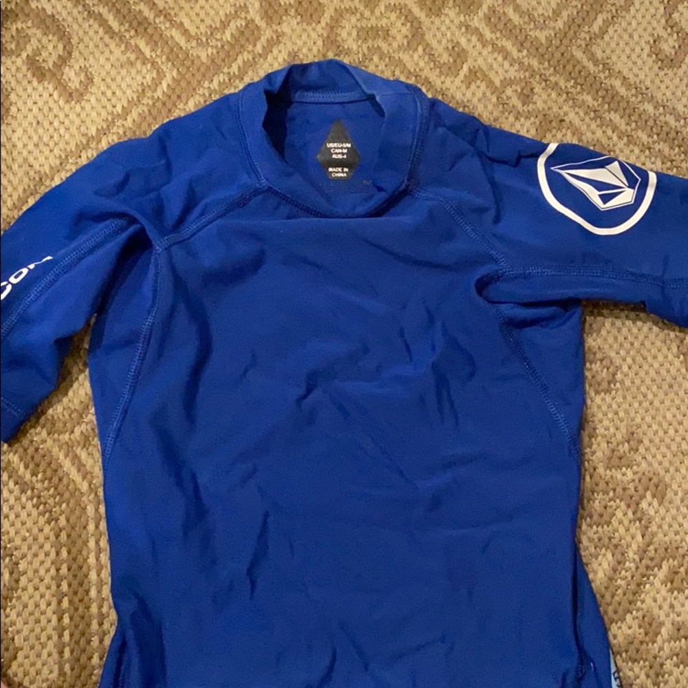 Blue and White Volcom rash guard